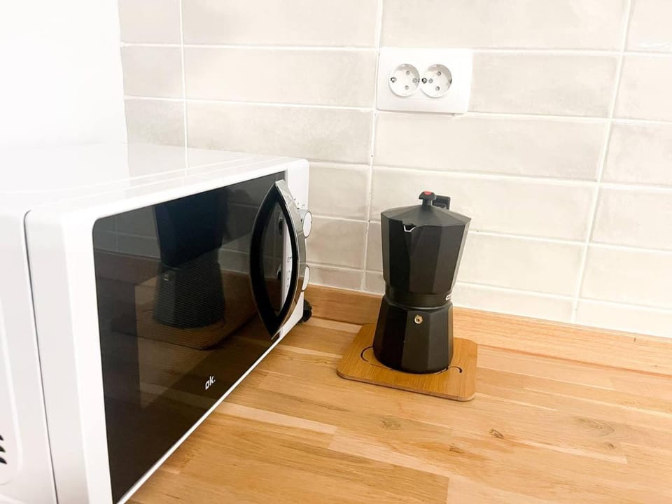 Kitchen or kitchenette, microwave