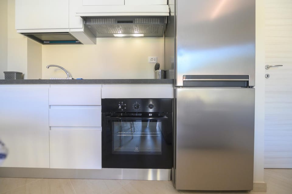 Kitchen or kitchenette, oven, stove