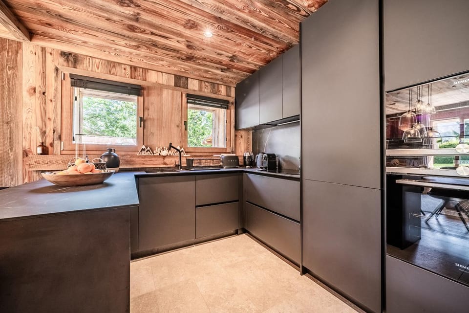 Kitchen or kitchenette, dishwasher, oven, stove