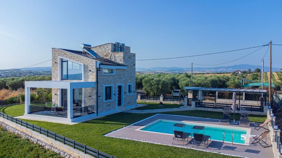 Property building, Natural landscape, Pool view, Swimming pool, sunbed