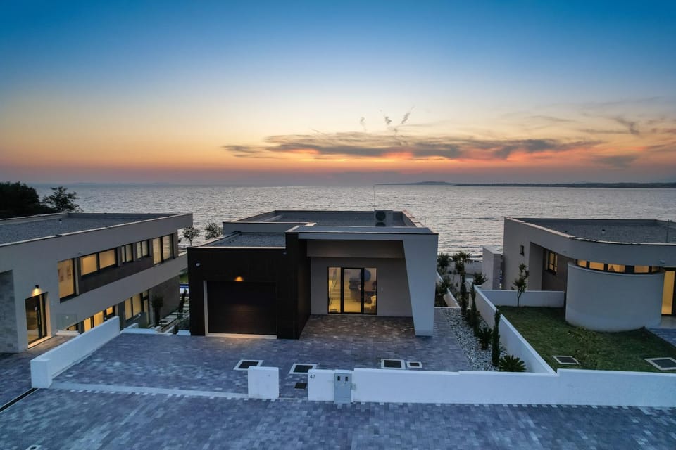 Property building, Natural landscape, Sea view, Sunset