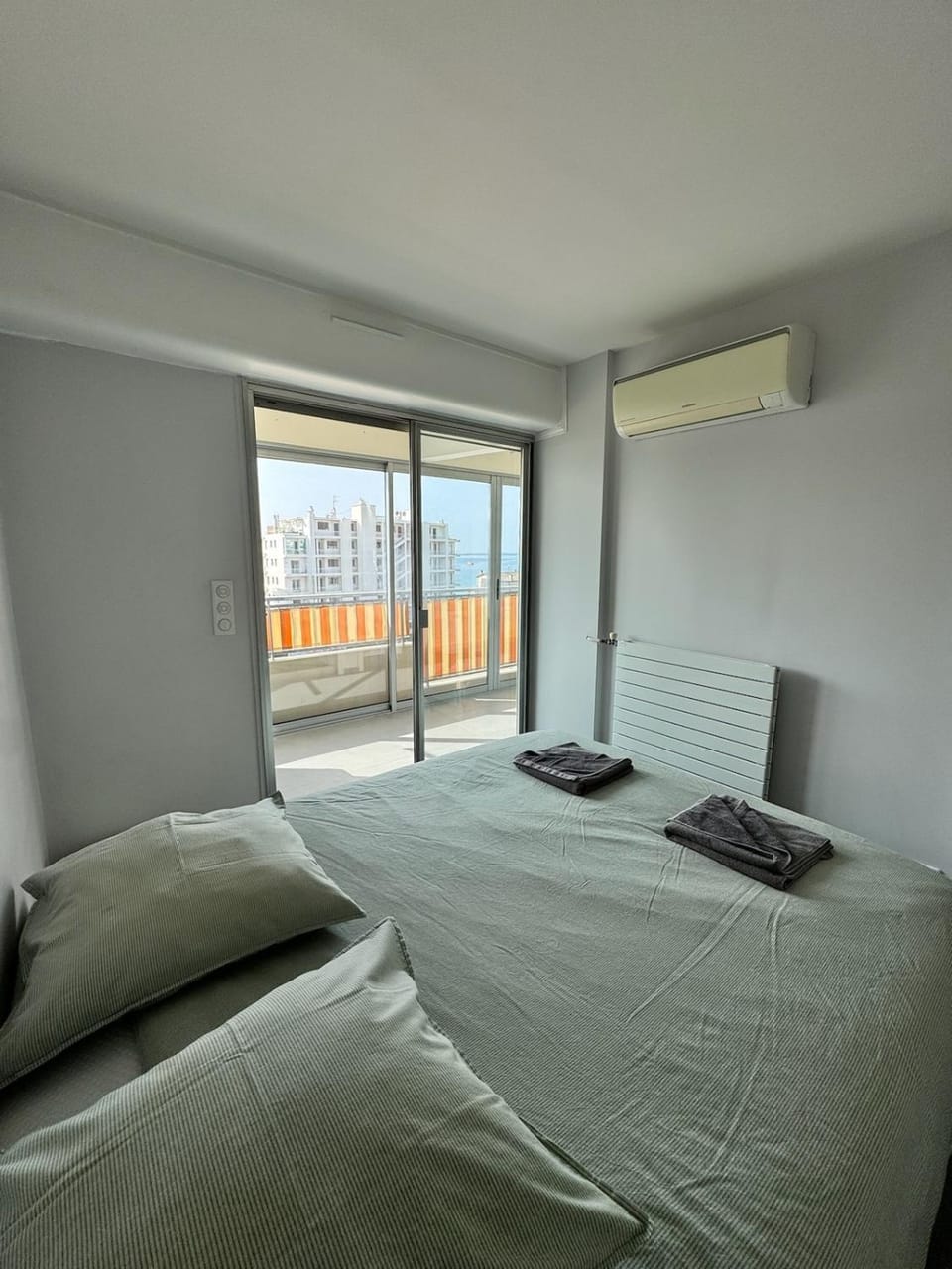 Bed, Photo of the whole room, Bedroom, towels, air conditioner