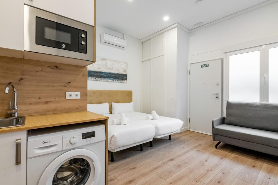 Bed, Living room, Photo of the whole room, Seating area, Bedroom, washing machine, air conditioner