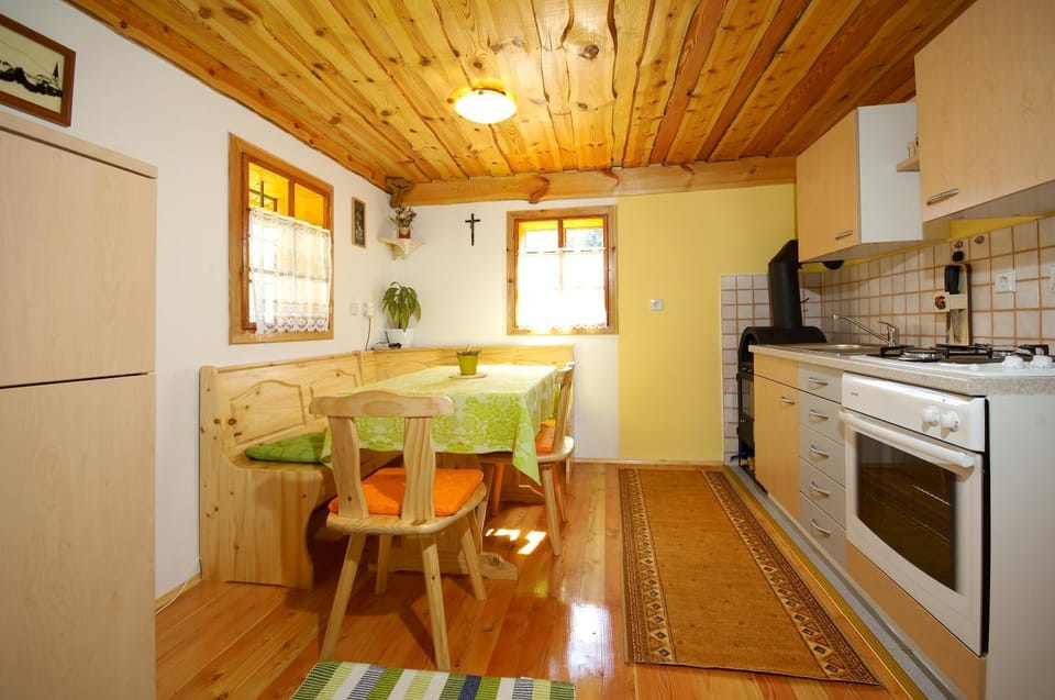 Dining area, fireplace, microwave, oven, stove, kitchen