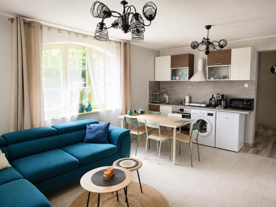 Kitchen or kitchenette, Dining area, microwave, stove, toaster, washing machine