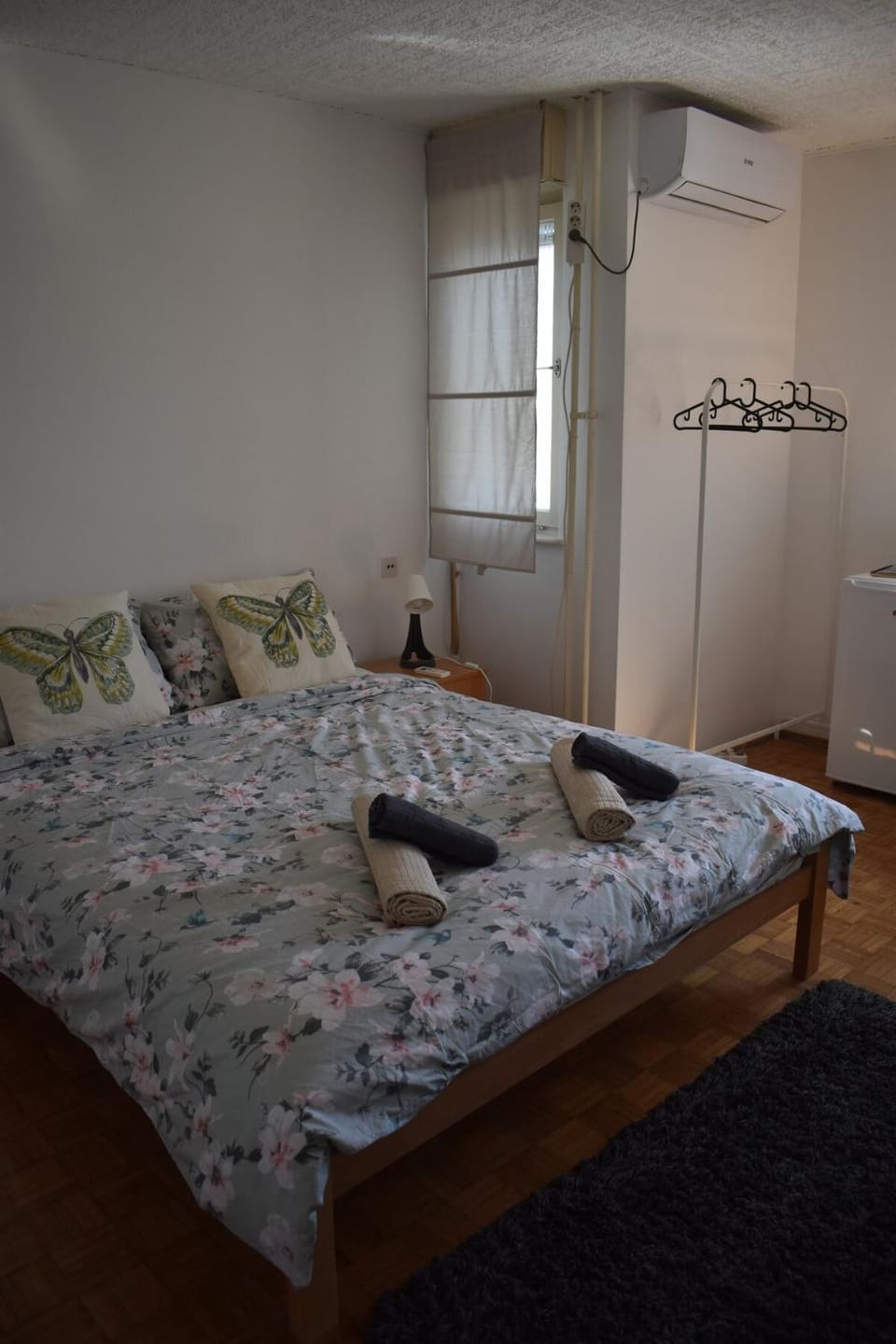 Bed, Photo of the whole room, Bedroom, towels, air conditioner