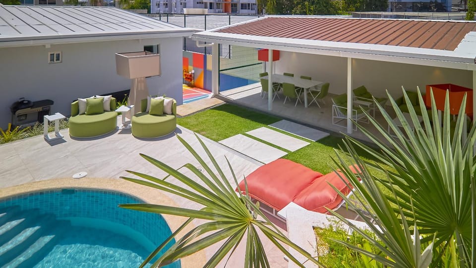 Property building, Patio, Garden, Pool view, Swimming pool, sunbed