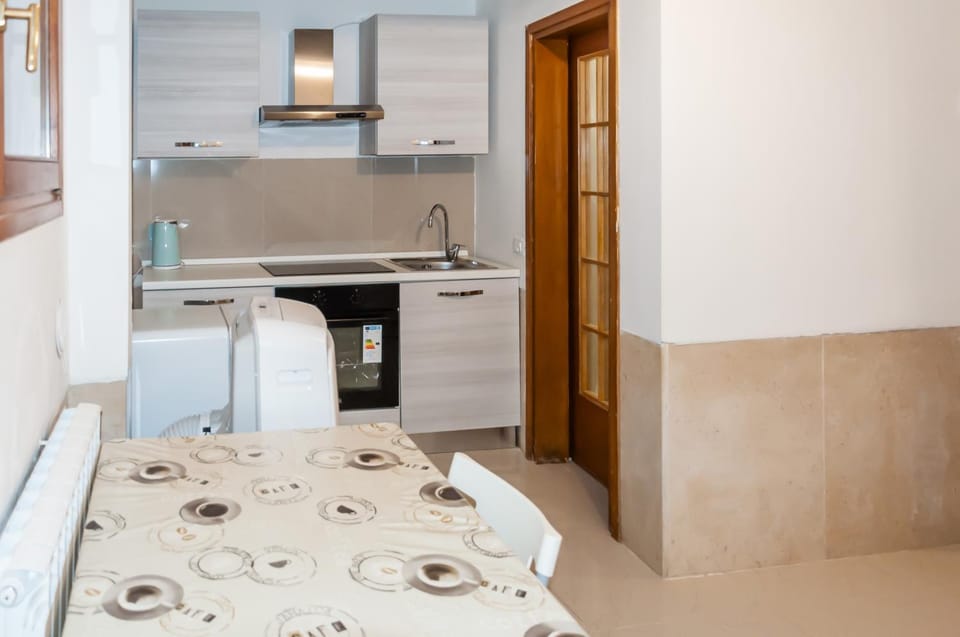 Kitchen or kitchenette, stove
