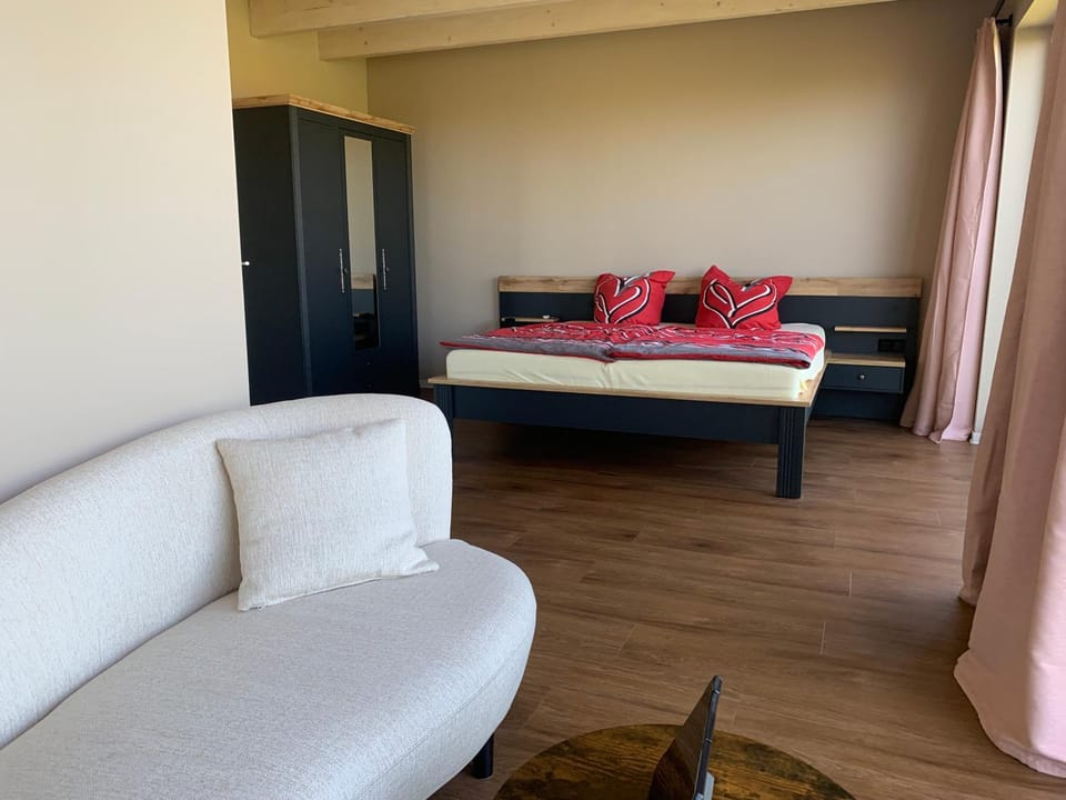 Bed, Seating area, Bedroom