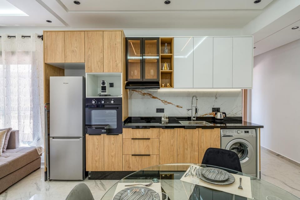 Kitchen or kitchenette, dishwasher, oven, stove, toaster
