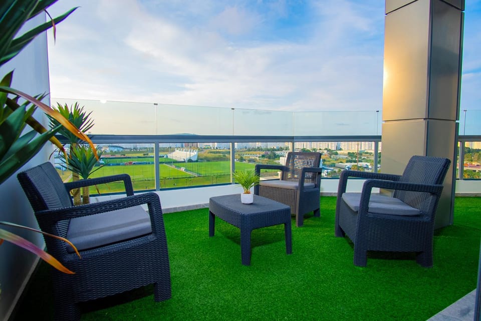Patio, View (from property/room), Living room, Seating area, Garden view