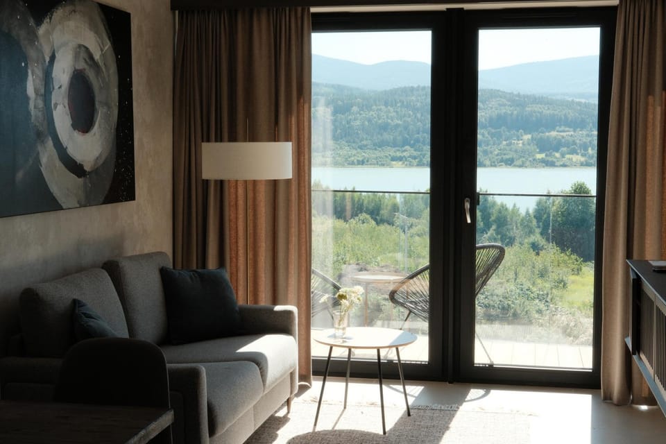 View (from property/room), Living room, Lake view, Landmark view, Landmark view, Mountain view, Mountain view