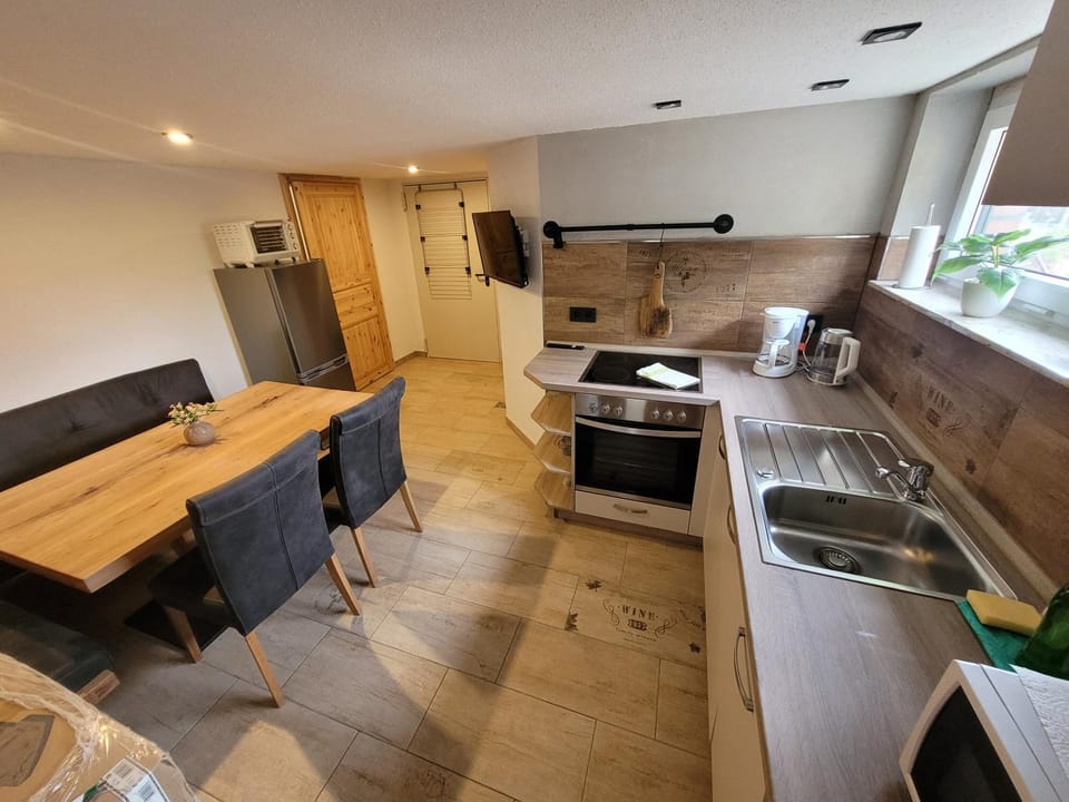 Kitchen or kitchenette, Seating area, Dining area, dishwasher, stove
