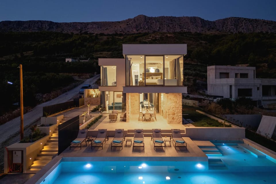 Property building, Patio, Night, Natural landscape, Mountain view, Pool view, Swimming pool, sunbed