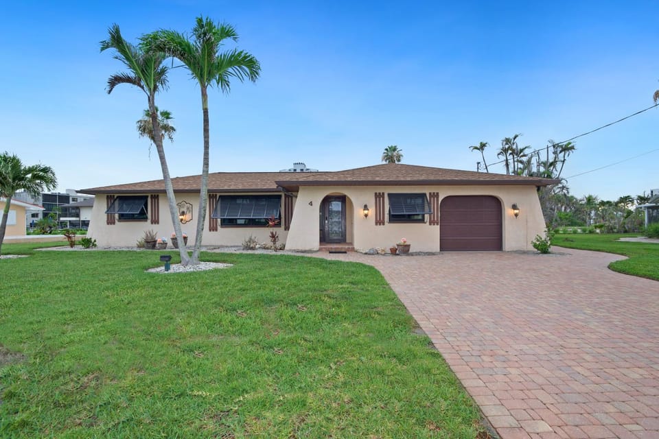Beach Retreat by Sun Palace Vacations House in Estero Island
