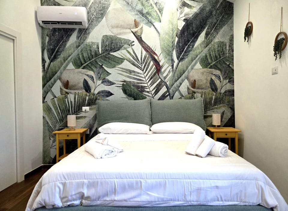 Bed, Photo of the whole room, Bedroom, towels, air conditioner