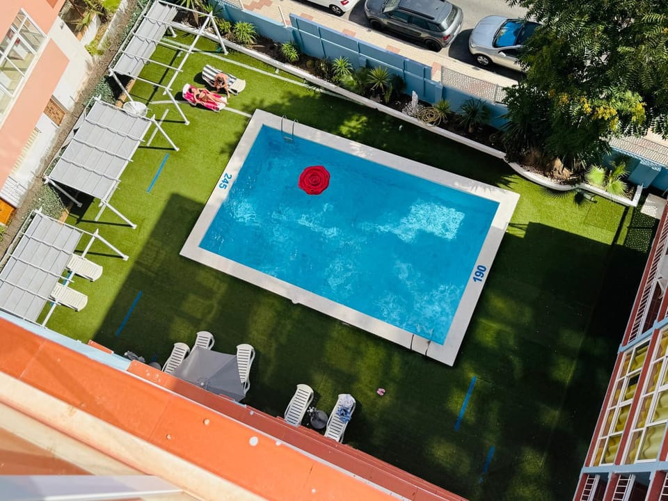 Property building, Pool view, Swimming pool, sunbed