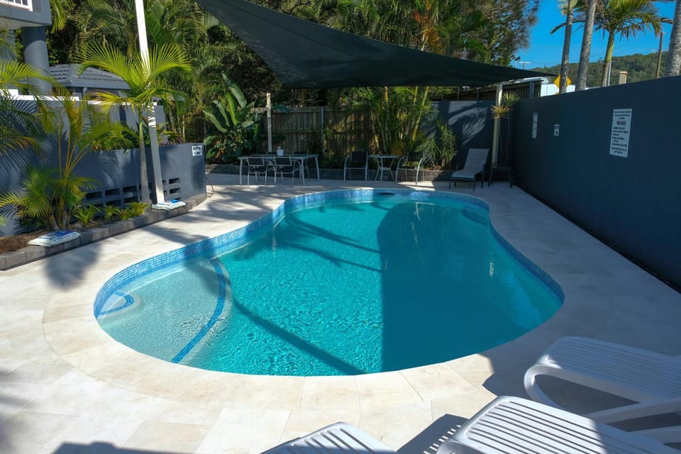 Swimming pool, sunbed