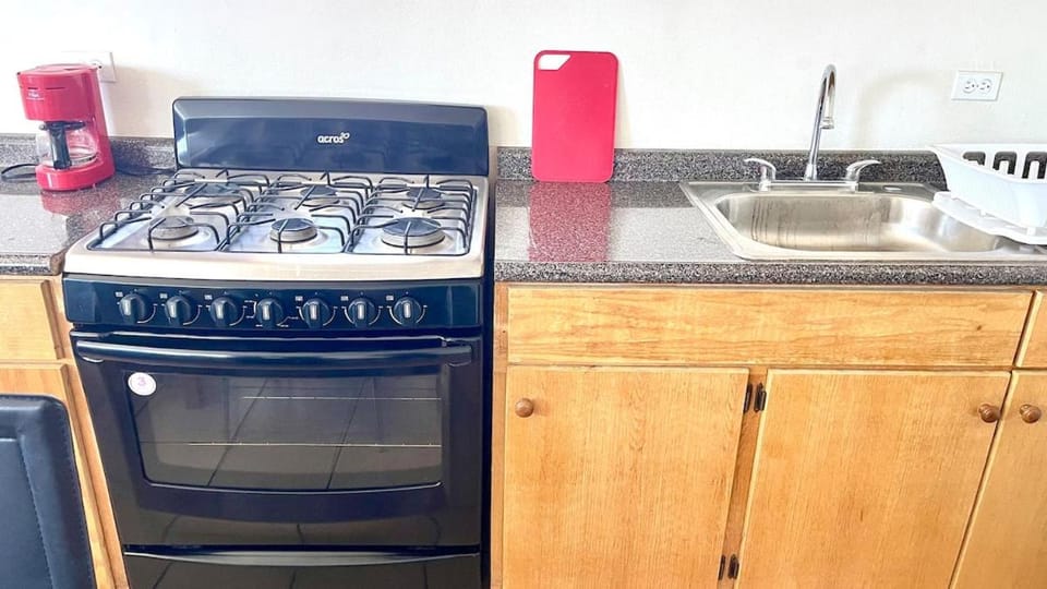 Kitchen or kitchenette, stove