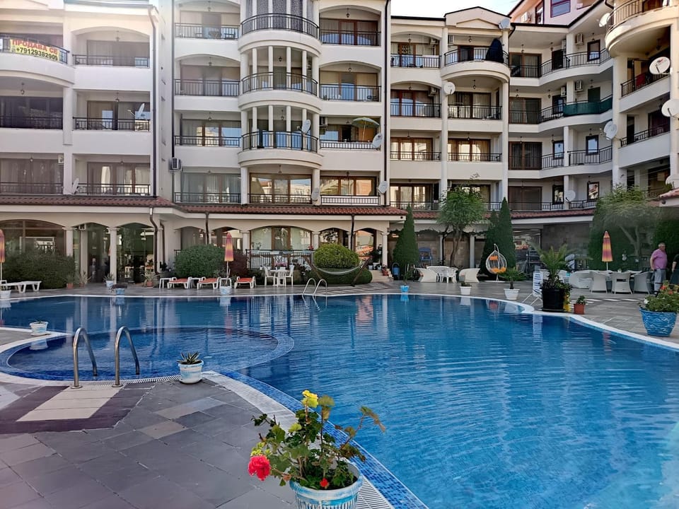 Property building, Patio, Swimming pool