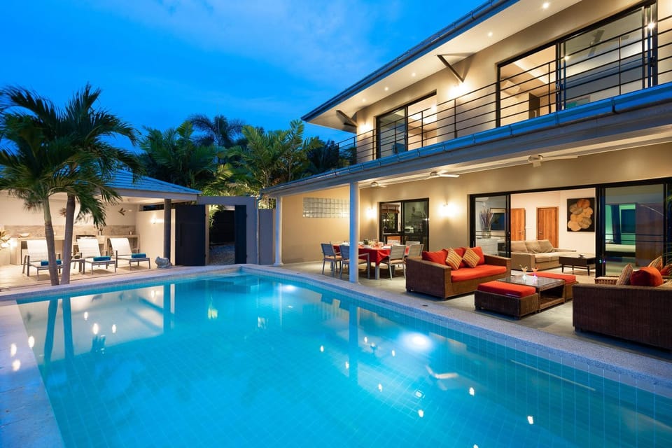 Property building, Patio, Balcony/Terrace, Living room, Seating area, Pool view, Swimming pool, sunbed