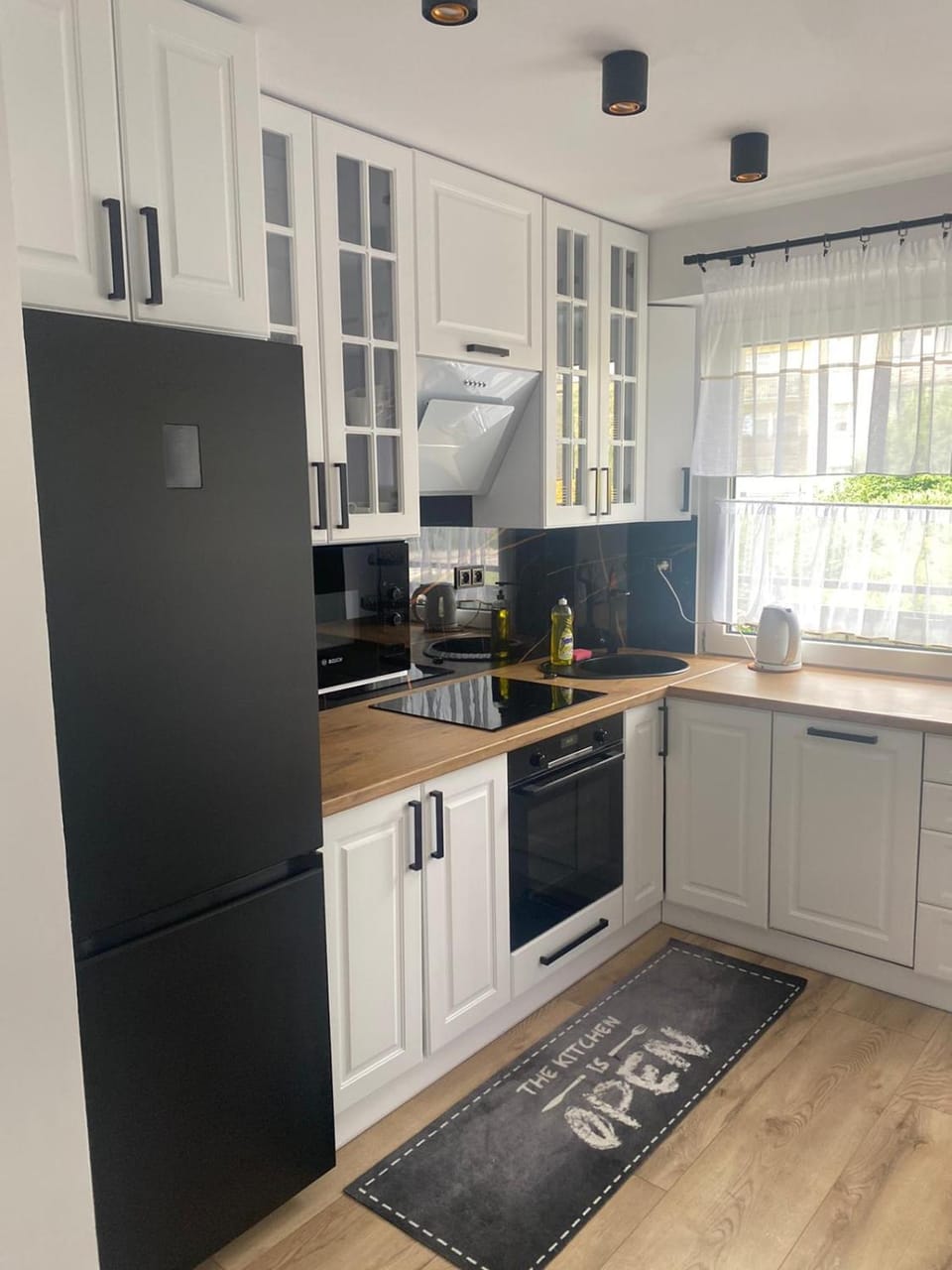 Kitchen or kitchenette, dishwasher, oven, stove, toaster
