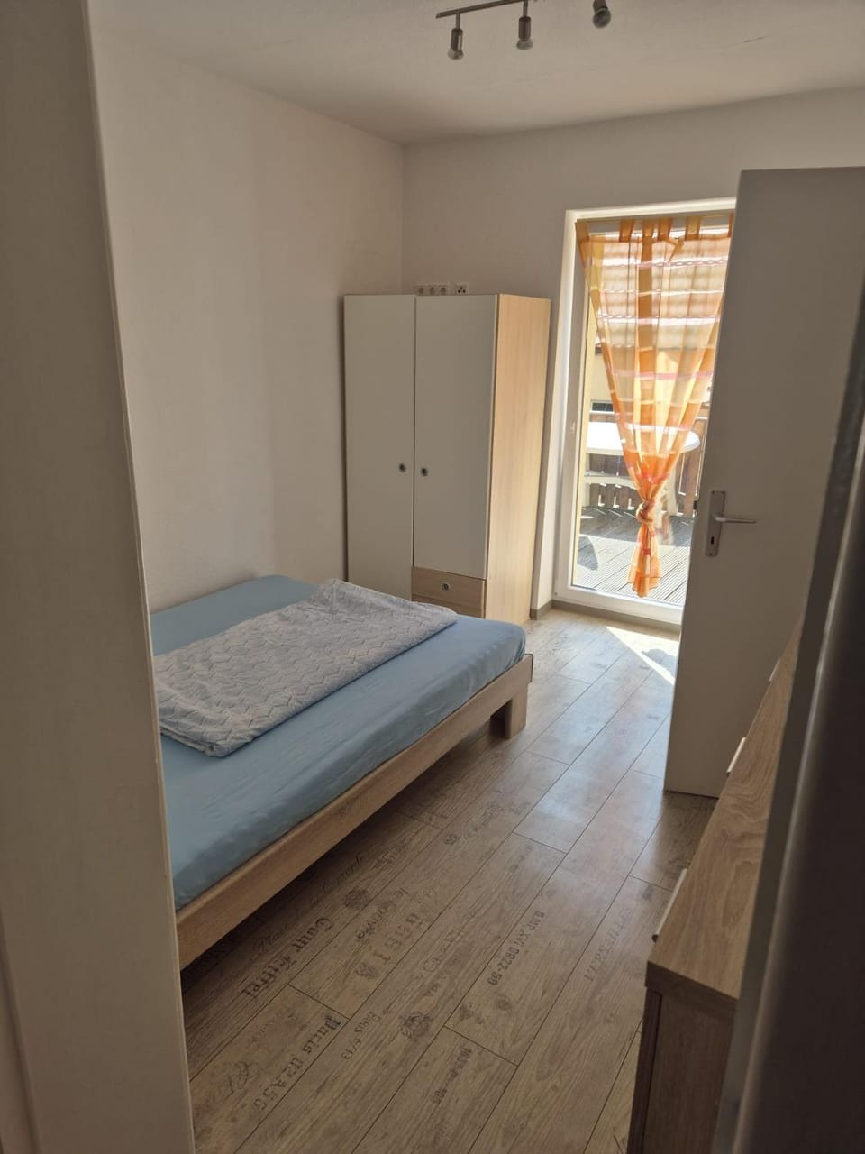 Bed, wardrobe