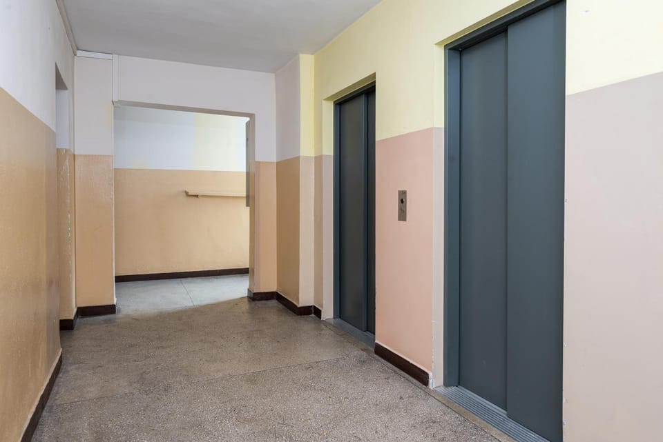 Property building, elevator