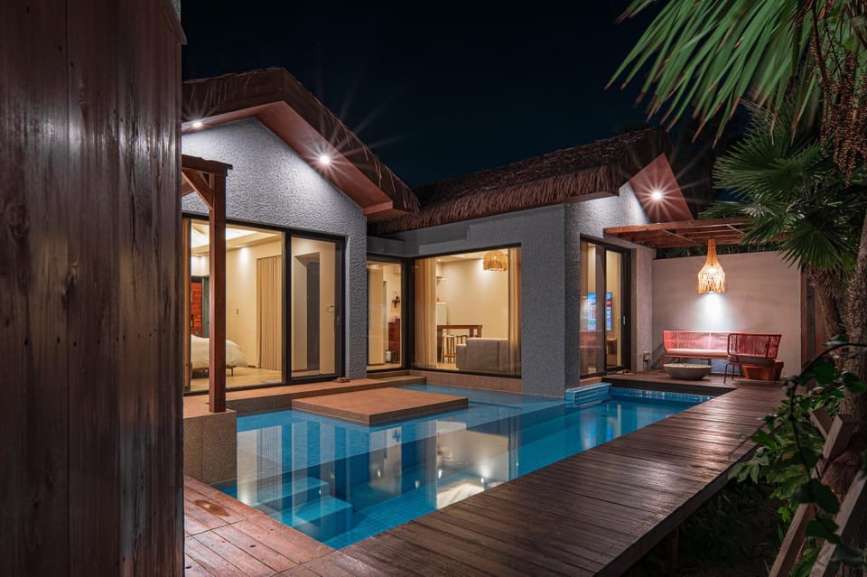 Property building, Patio, Night, Pool view, Swimming pool