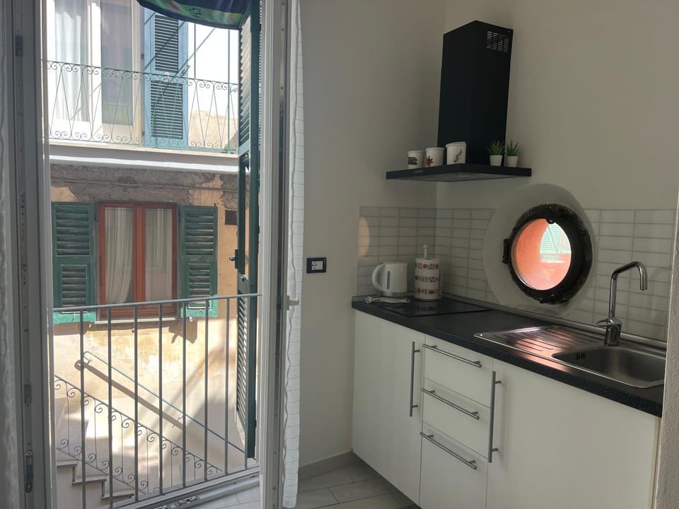 Kitchen or kitchenette, stove