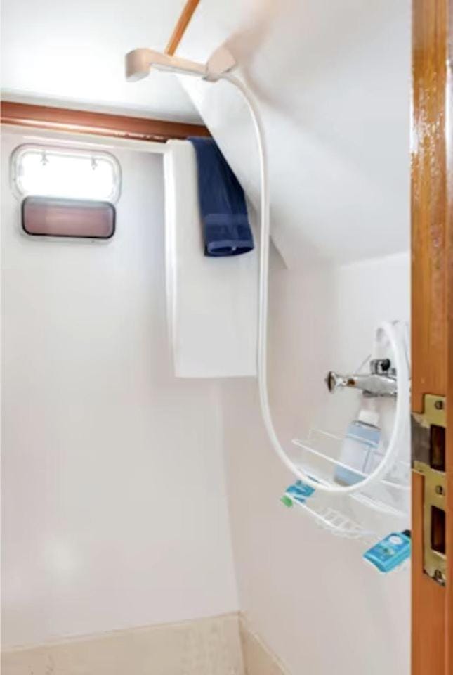 Experience the Magic of Sleeping Your Own Private Yacht in Damariscotta, Maine Docked boat in Damariscotta