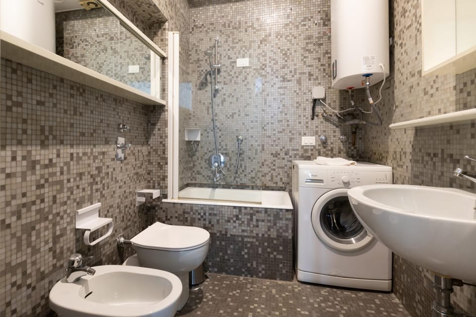 Shower, Toilet, Bathroom, bidet, towels, washing machine