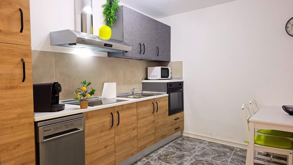Kitchen or kitchenette, dishwasher, oven, stove, toaster