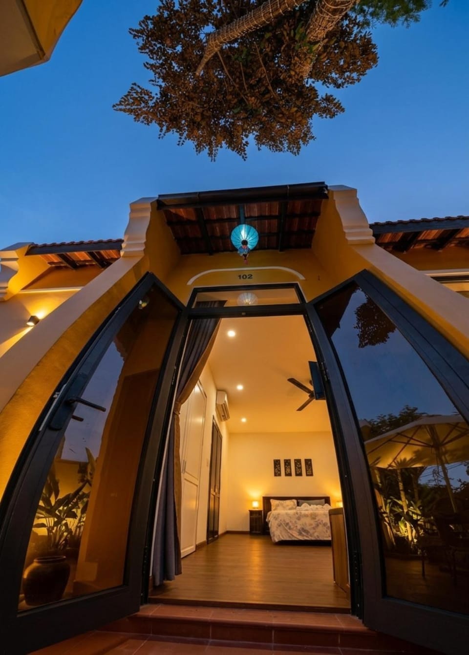Property building, Patio, Night, View (from property/room), Balcony/Terrace, air conditioner