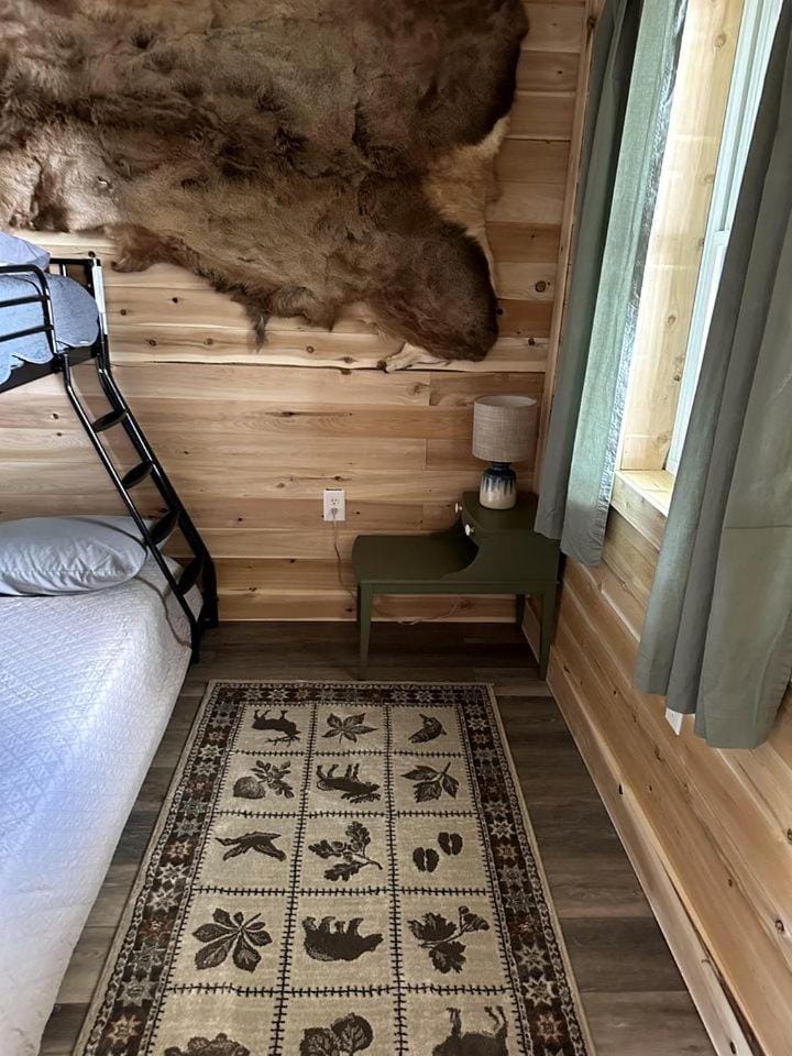 Magnificent Cabin Nestled Amidst Trees in Portage Lake, Maine Cabin in Maine