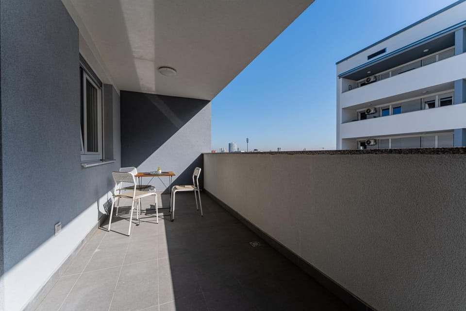 Property building, Patio, Day, View (from property/room), Balcony/Terrace