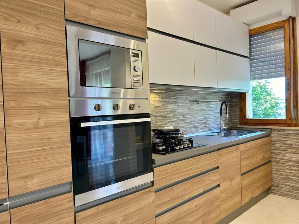 Kitchen or kitchenette, oven, stove