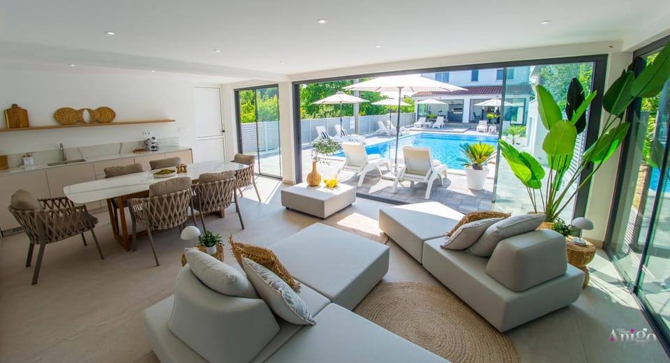 Living room, Seating area, Dining area, Pool view, Swimming pool, sunbed