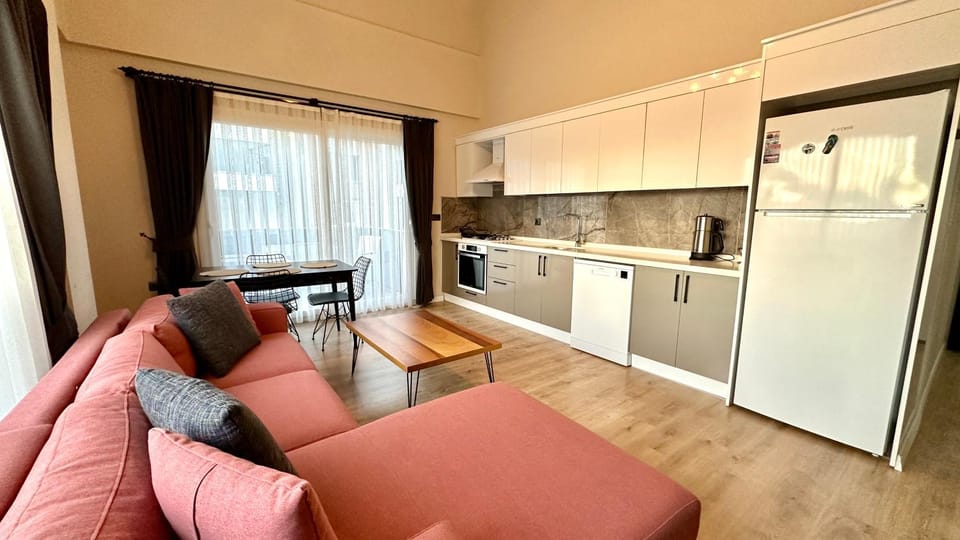 Kitchen or kitchenette, Living room, Seating area, Dining area, dishwasher, oven, stove