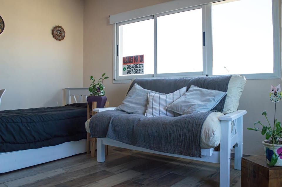 Bed, Living room, Seating area