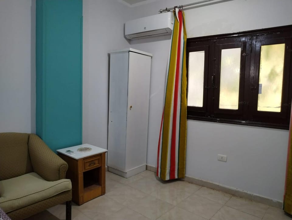 Seating area, wardrobe, air conditioner