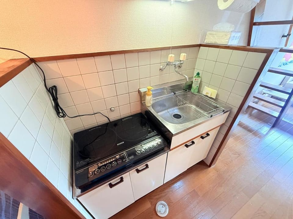 Kitchen or kitchenette, stove