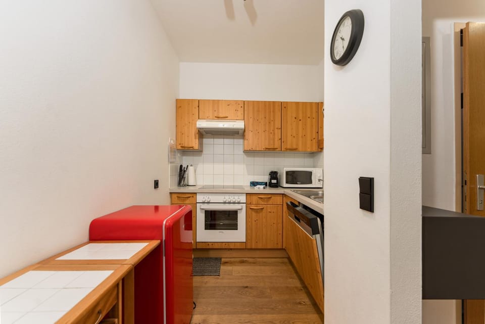 Kitchen or kitchenette, dishwasher, stove, washing machine