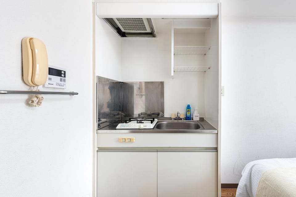 アスピア502 7-minute walk from Nishi-Sugamo Station 9-minute walk from Sugamo Station 1-minute walk from Koshinzuka WiFi available Apartment in Japan