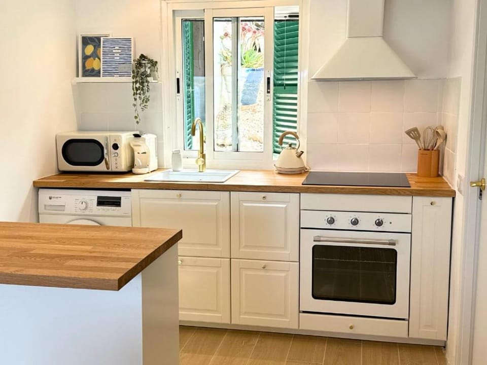 Kitchen or kitchenette, oven, stove, toaster