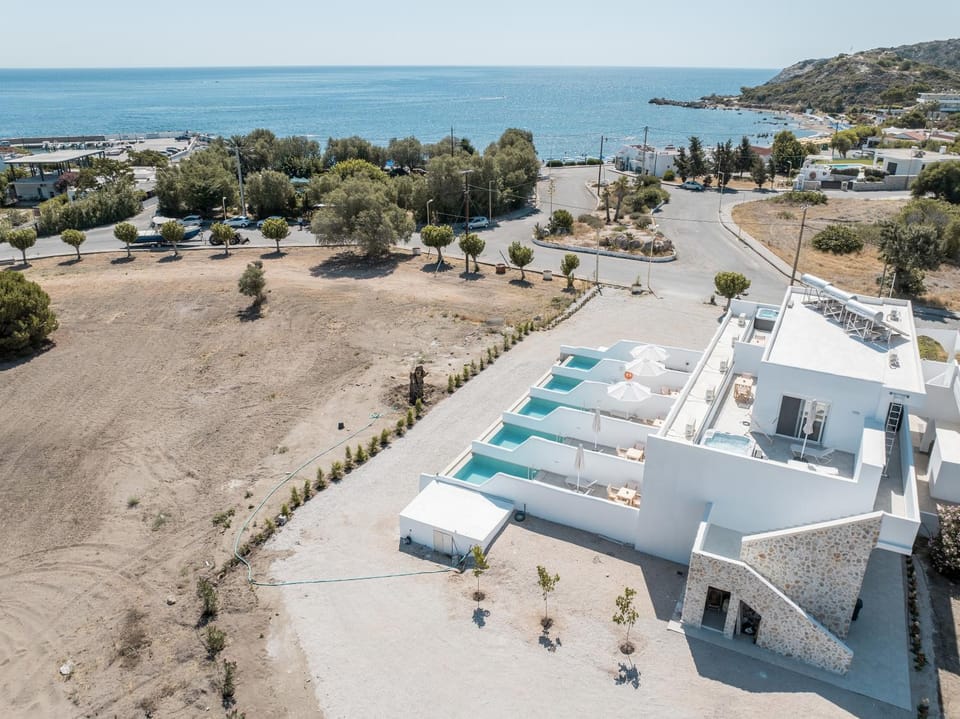 Property building, Day, Beach, Location