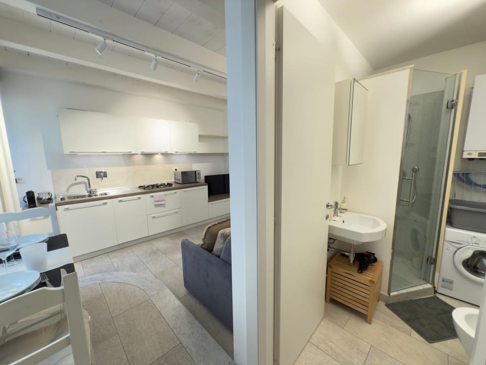 Toilet, Bathroom, Kitchen or kitchenette, stove, washing machine