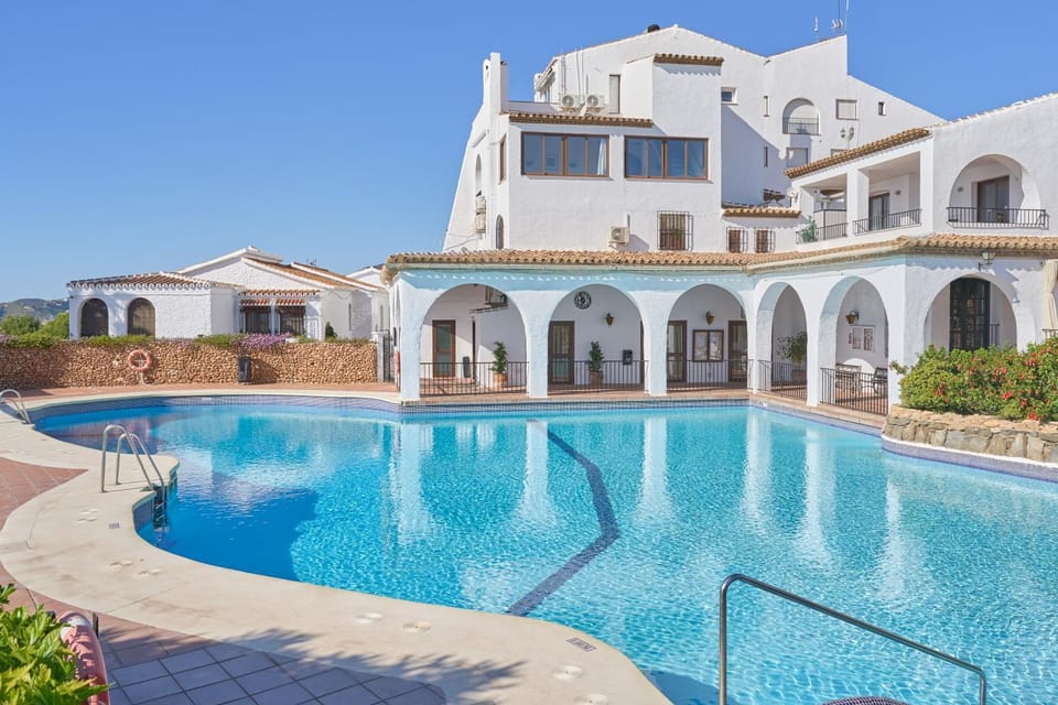Property building, Living room, Swimming pool