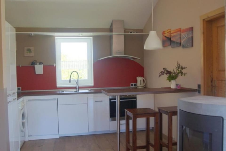 4 Personen Ferienhaus mit Kaminofen, Wintergarten und Kanu, mit einem wundervollen Blick auf den See in Otterndorf House in Otterndorf