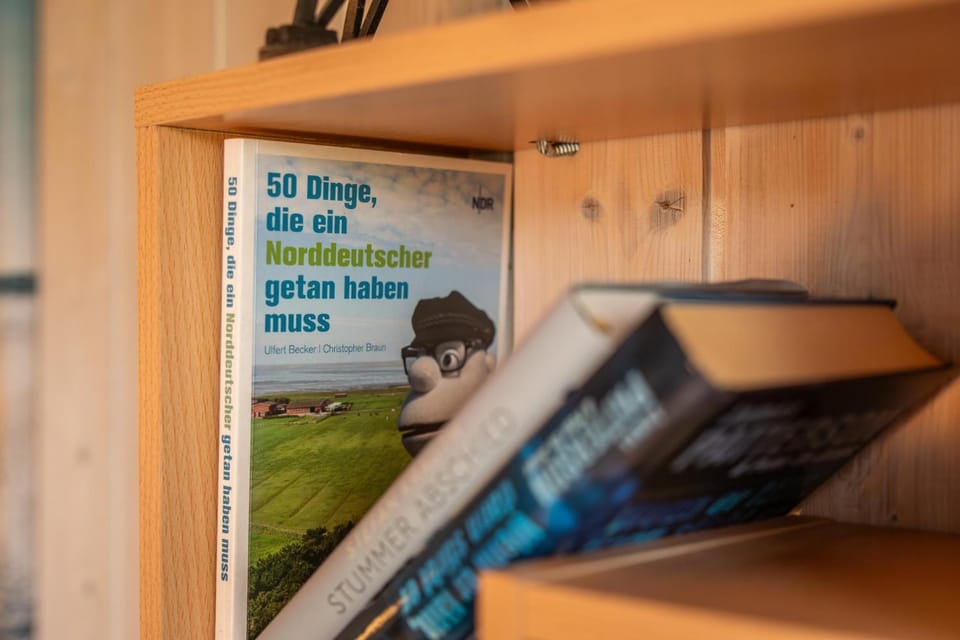 6 Personen Ferienhaus in direkter Seelage mit Bootsteg und Kanu sowie Sauna, Whirlpool und Kaminofen in Otterndorf House in Otterndorf